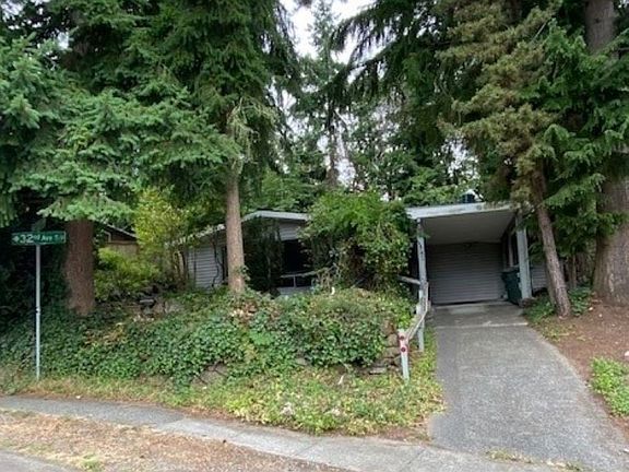 The Attached Carport & Driveway provide Off Street Parking.