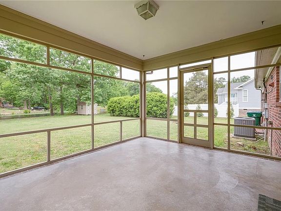 Screened back porch to enjoy the lake view