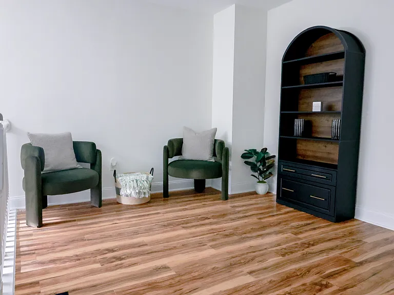 Versatile flex space perfect for a home office, reading nook, or additional lounge area. Bright, open layout with beautiful hardwood flooring.