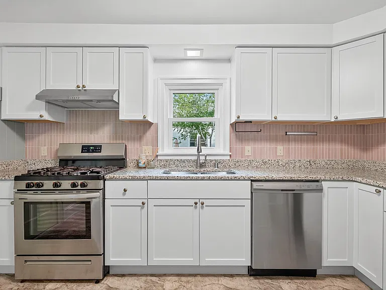 Modern Kitchen with stylish finishes and ample workspace.