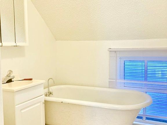 Bathroom with a beautiful clawfoot tub.