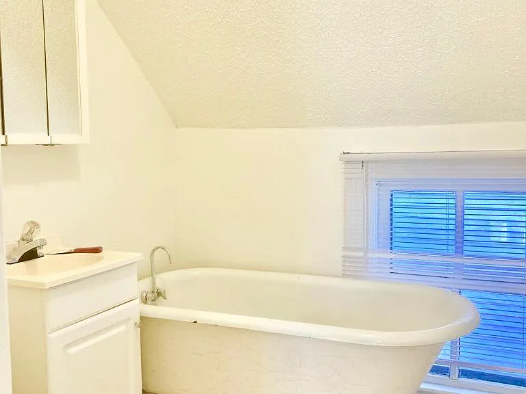 Bathroom with a beautiful clawfoot tub.