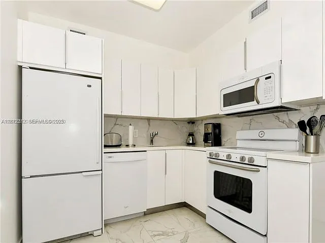 5151 Collins Ave — Photo 1