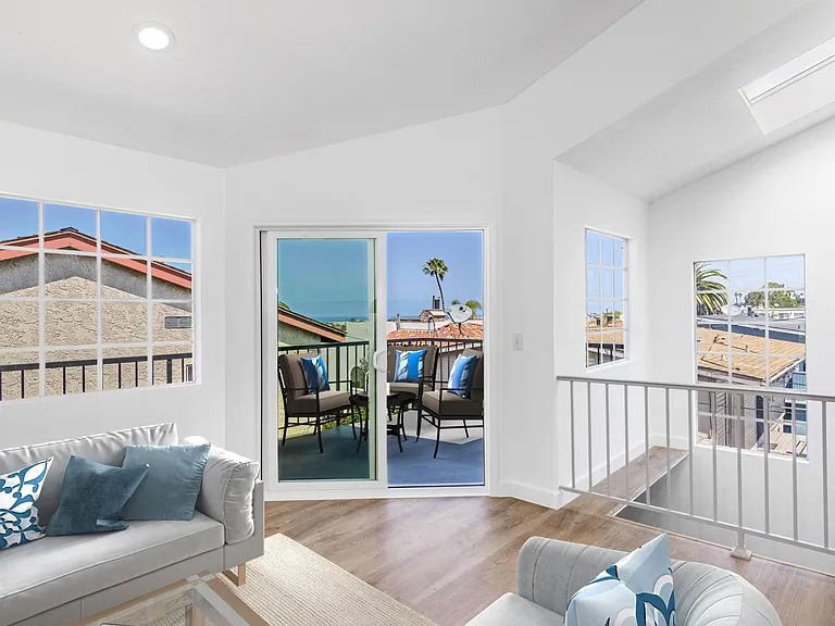 Living room and view balcony (virtual staging added)