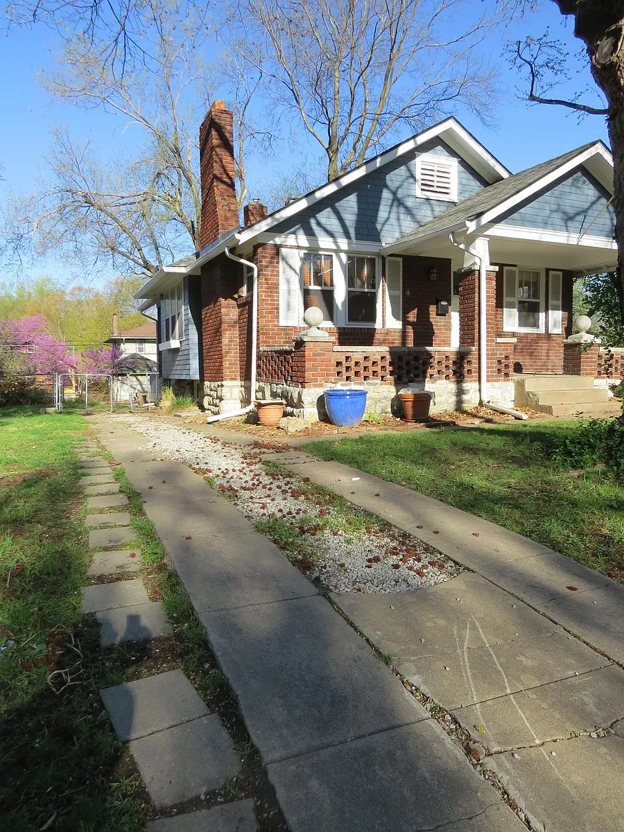 view of driveway and side of house. house faces east. - 4172 Cambridge St