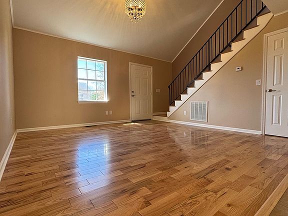 Livingroom with half cathedral ceiling