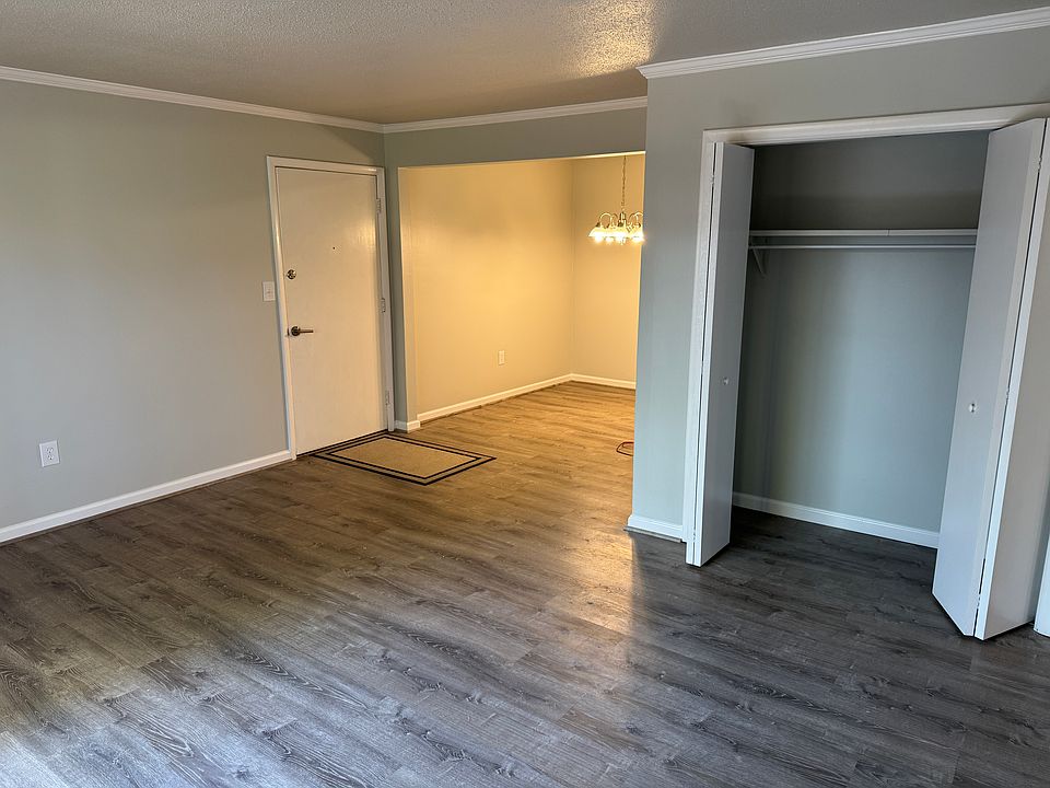 Living room to front door note large closet