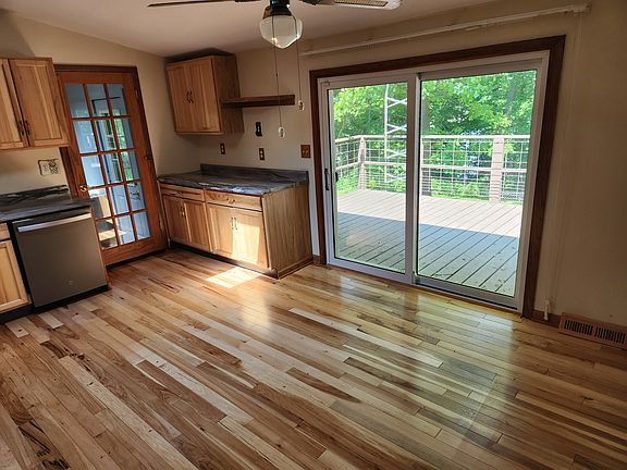 Remainder of kitchen plus dining area.