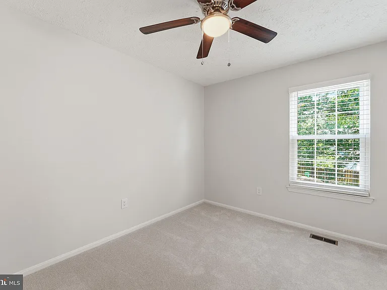 E Rosecroft Village Cir — Photo 16