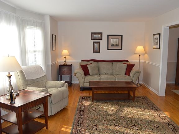 Bright living room with hardwood floors