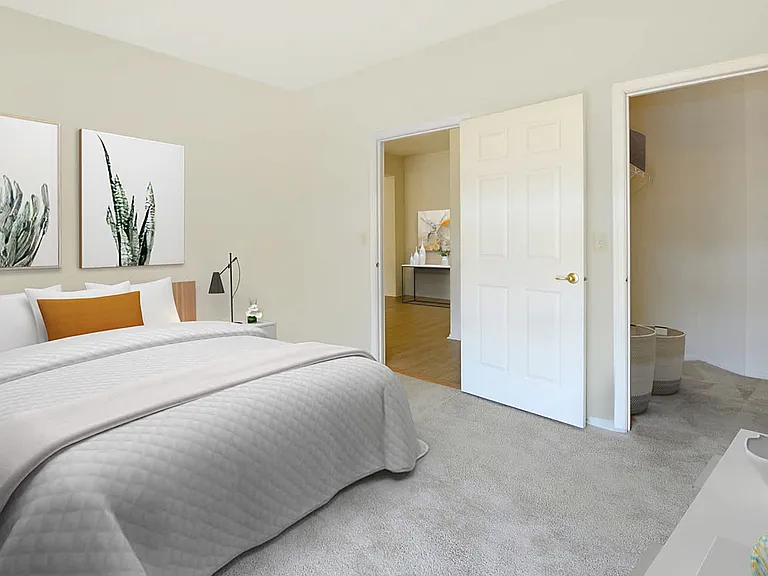 Carpeted Bedroom with Walk-In Closet
