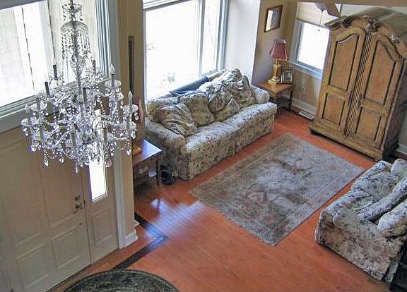 formal living room with Schonbeck Handcut Crystal Chandelier