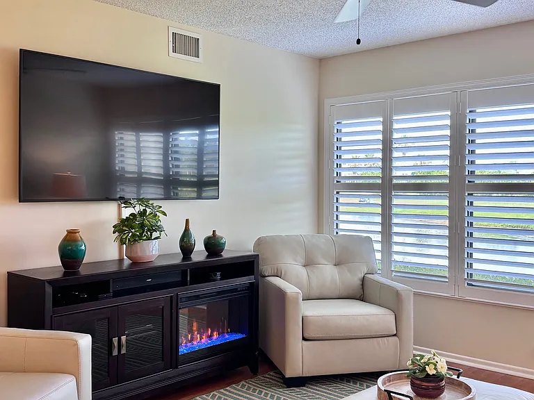 Cozy on up into this lovely 1st floor furnished 1bed/1bath condo w/ an electric fireplace!