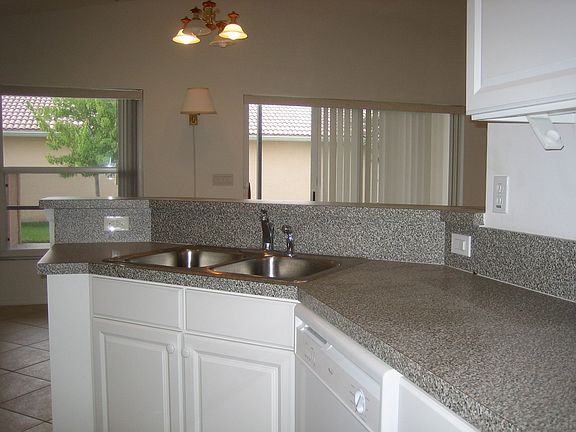 Kitchen opens up to casual dining area