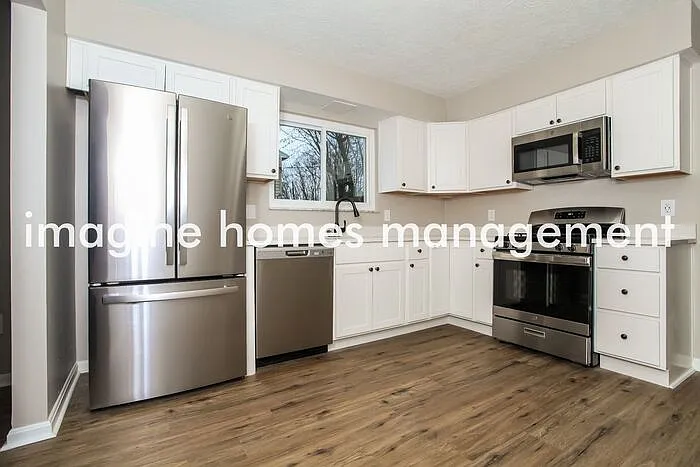 1409 Hilltree Dr — Photo 6