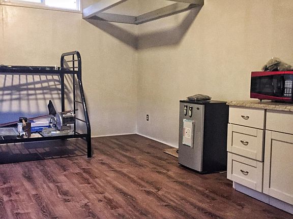 Private detached loft studio/in-law suite (250 sq feet) with air conditioner, kitchenette, private bathroom and private entrance. Furnishings not included