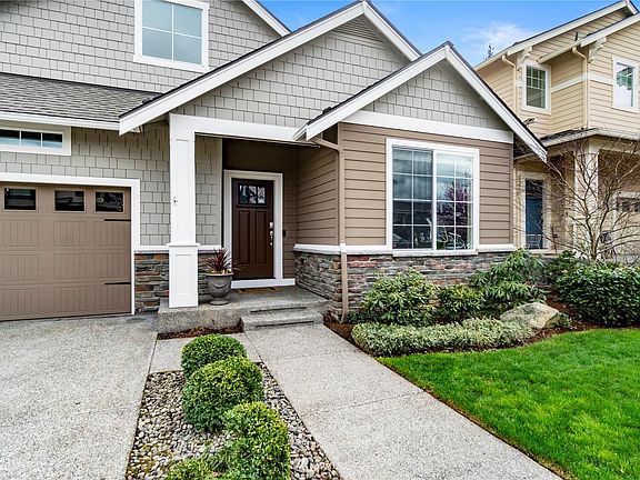 This home has mature landscaping and plenty of curb appeal.