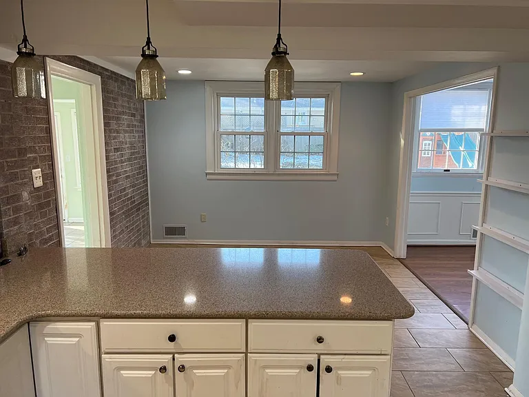 Kitchen walls are now pale blue, as is Dining Room. More photos of new paint at end of listing.