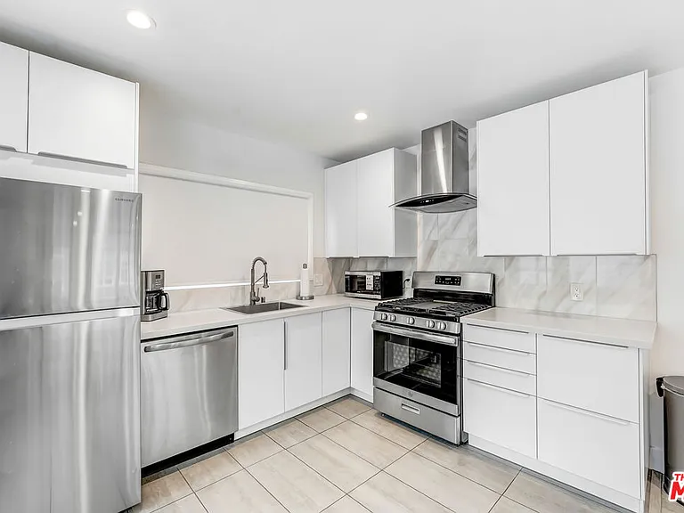 6145 Carlos Ave — Photo 10