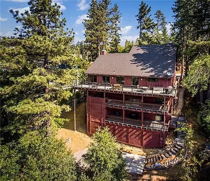 Birds eye view of property. Apartment A is the bottom floor, with steps down to parking pad & driveway.