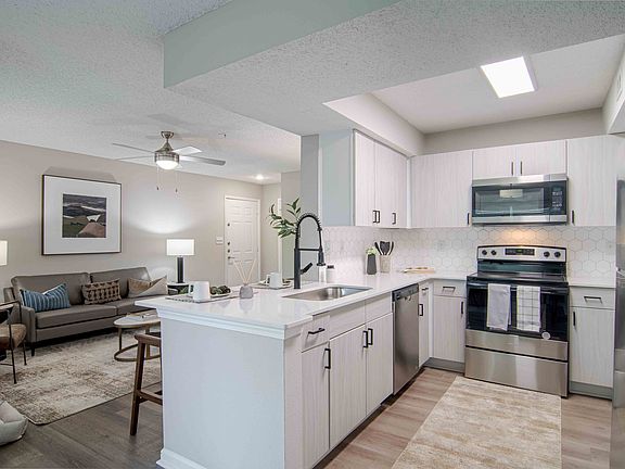 Newly Renovated Kitchen with Quartz Countertops and Stainless Steel Appliances