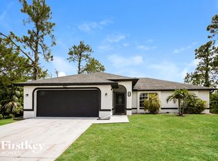 734 Chattman St E, Lehigh Acres, FL 33974