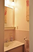 1st Flr half bath~ tile floor