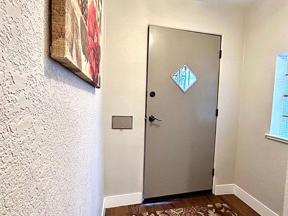 front entrance with coat closet