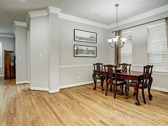 The formal dining room could also function as a downstairs office space.