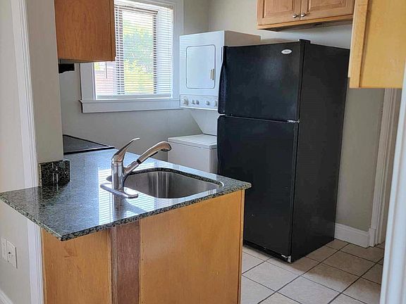 Kitchen with window and new in-unit washer & dryer