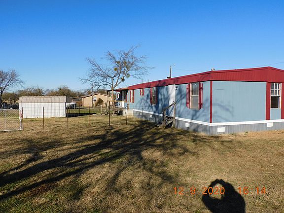 Back yard, fenced dog area and shed