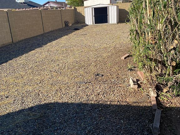Plenty of extra yard with shed.