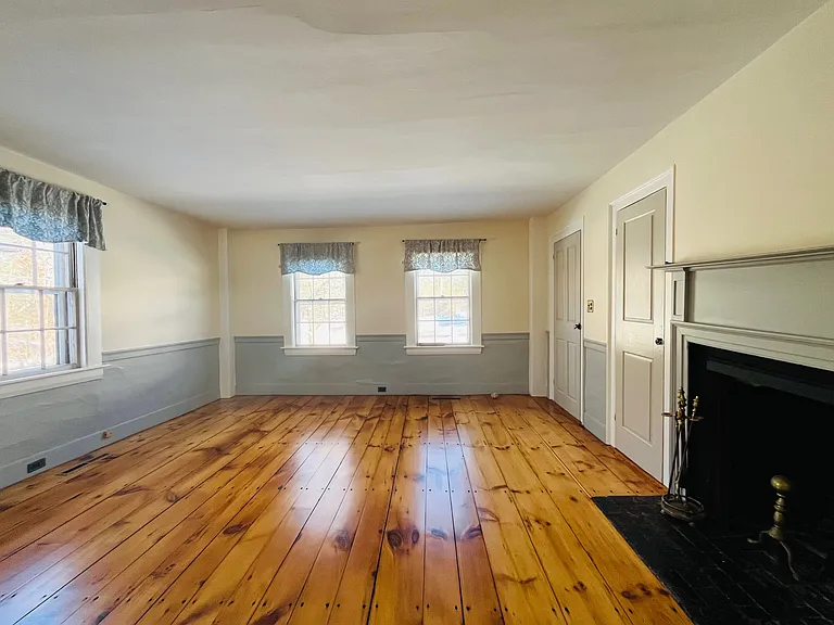 Formal dining room with decorative fireplace