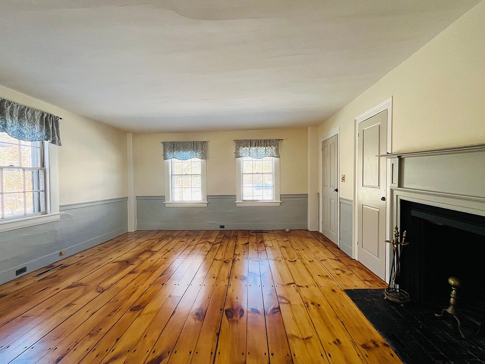 Formal dining room with decorative fireplace