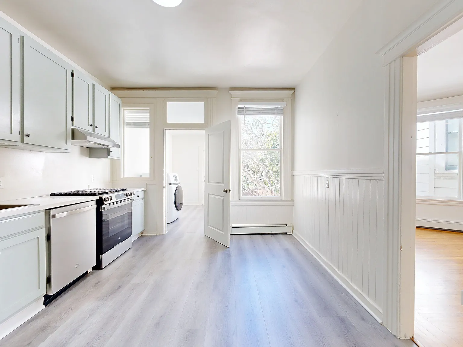 Spacious 3BR with Yard & In-Unit Laundry | Pet Friendly — Photo 2