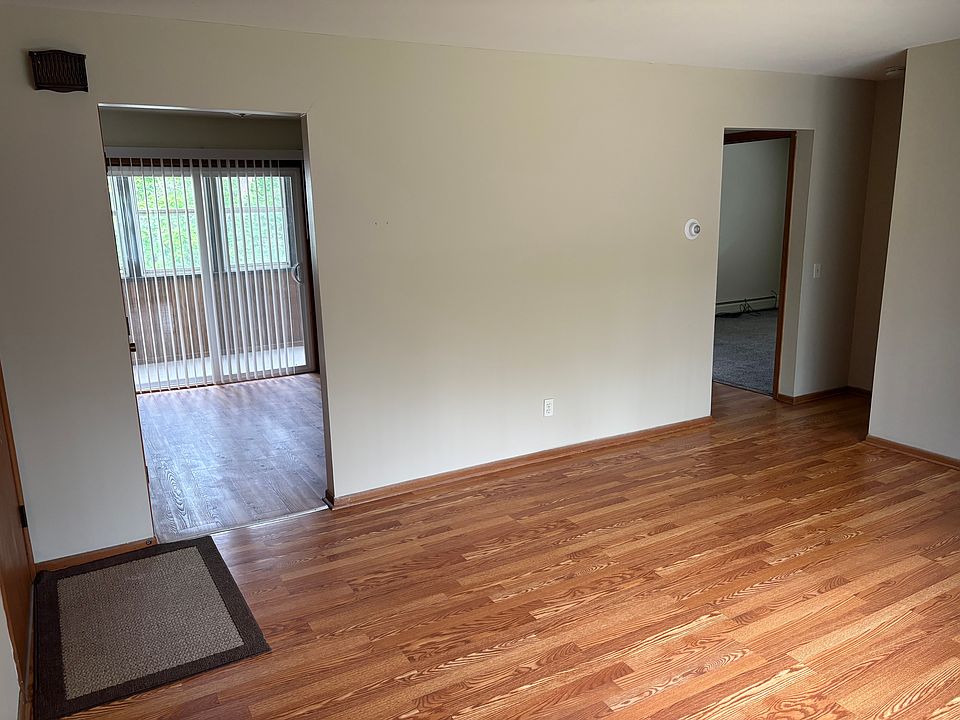 Living room to kitchen and hallway to bath and bedrooms