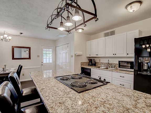 Recently updated, with new cabinets and granite countertops.