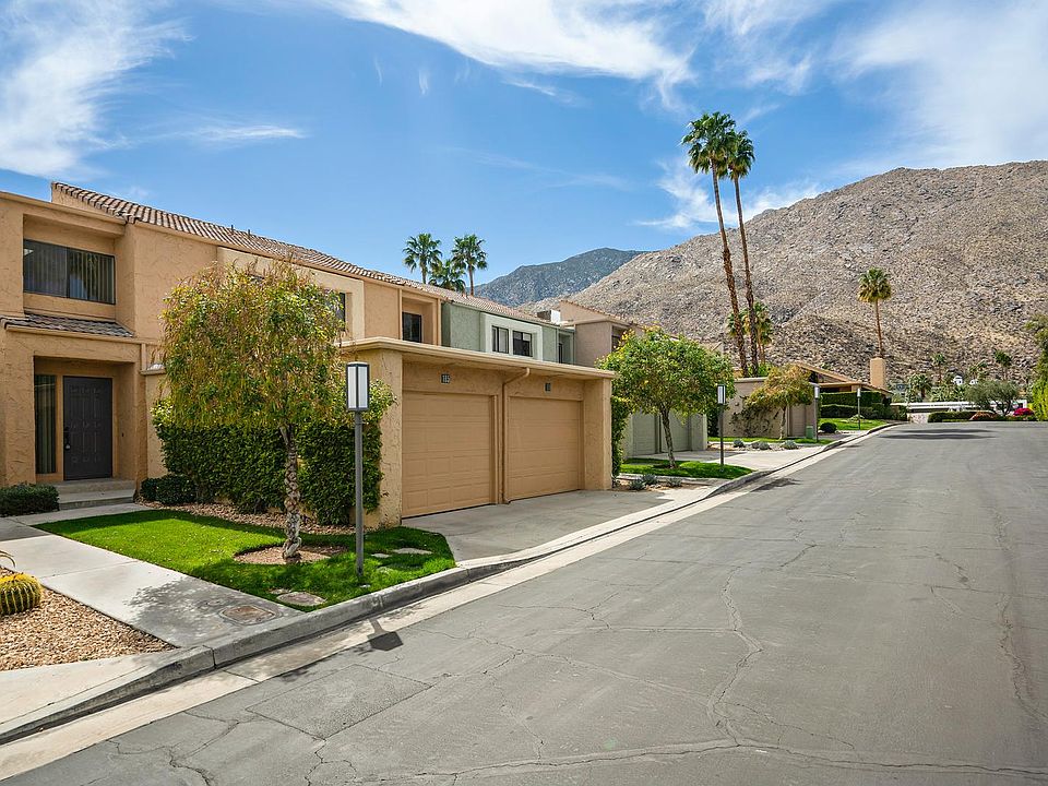 Entrance, attached garage and mountain view (and plenty of parking on private road also)