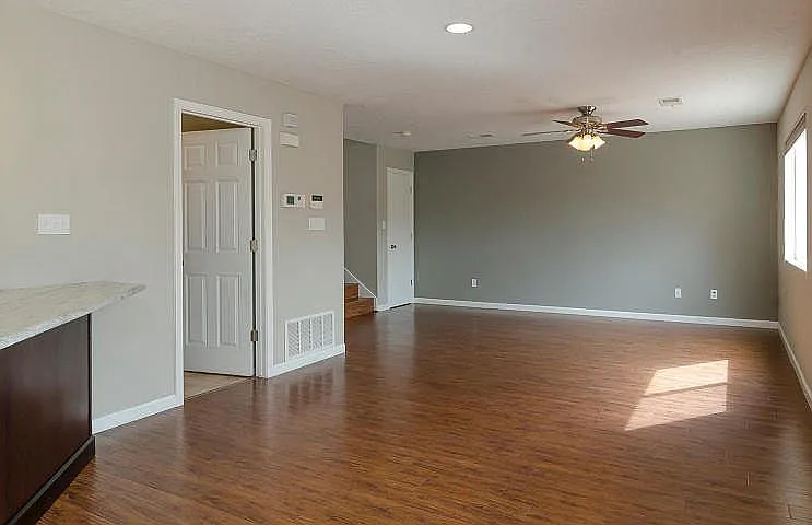Living Room with access to garage and laundry room
