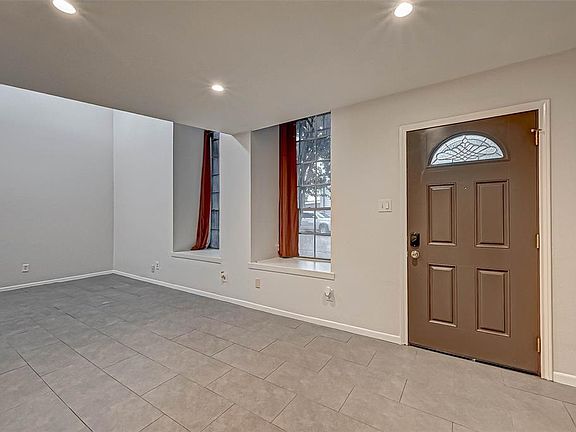 Expansive living space with room for office area. Tile floors - no carpet!
