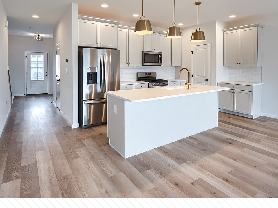 Spacious Kitchen with Upgraded Counter Tops, Refrigerator, Stove, Microwave and Cabinets