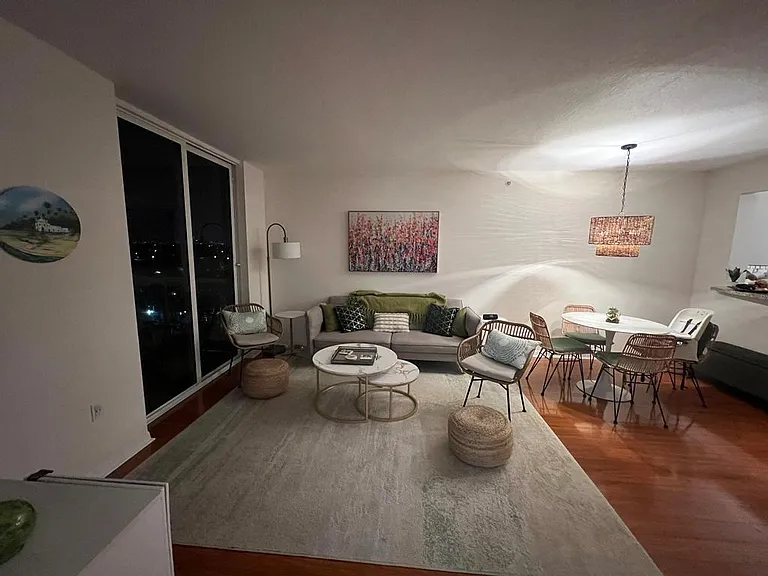 Living space and dining room - view into space from Kitchen.