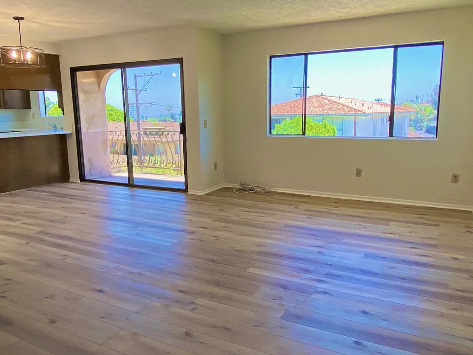 New wood-grain vinyl floors throughout