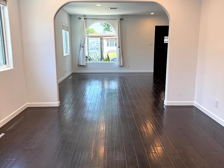Bright dinning room filled with natural light and dimmable recessed LED lighting.