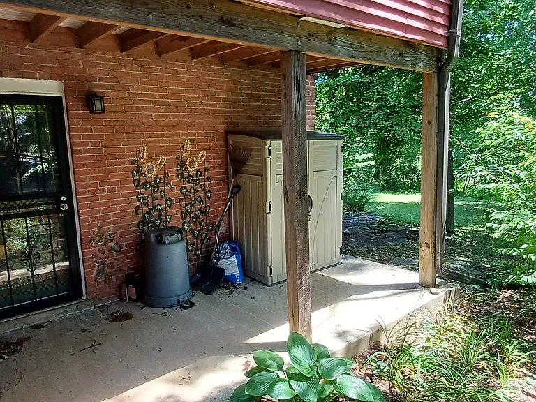 Entrance to shady backyard.