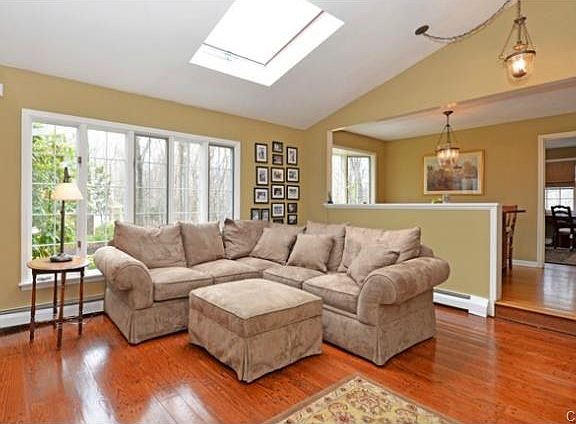 Large family room however,  still affords a cozy feel, nicely lo