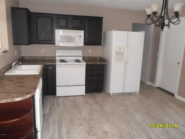 11509 W Charter Oak Rd — Photo 4