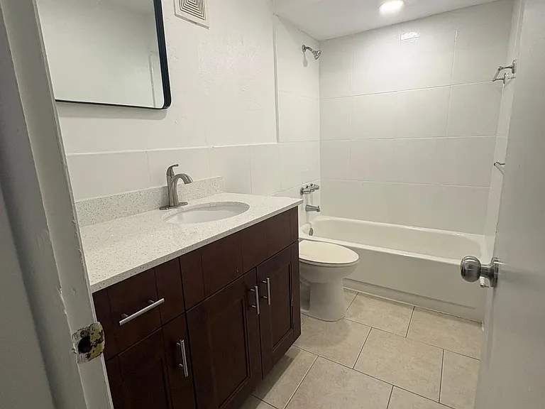 5861 NW 16th Pl #303 — Photo 7