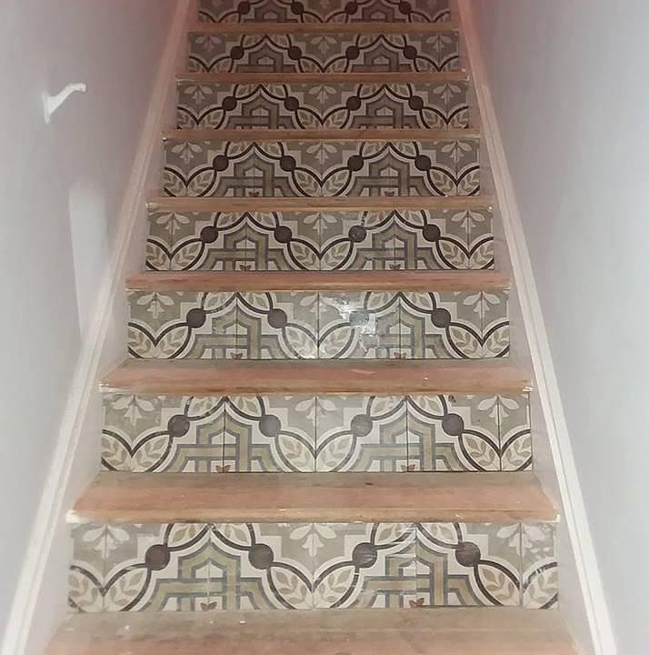 tiled risers on stairs, Banister installed