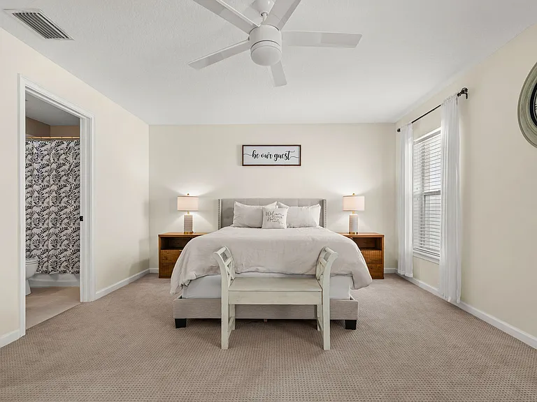 Downstairs bedroom with en-suite full bathroom and large walk-in closet